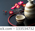 Japanese style image of steaming sake and plum branches 133534732