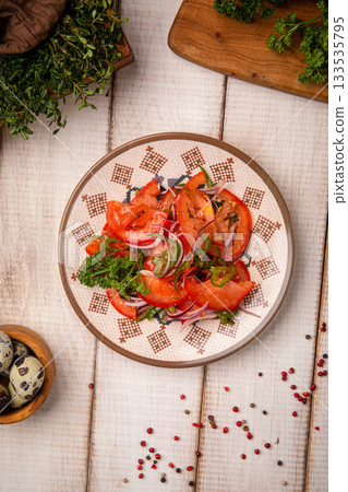 Fresh achichuk salad with vegetables 133535795