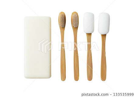 A set of bamboo toothbrushes alongside a bar of soap, emphasizing eco-friendly dental hygiene and personal care. A set of bamboo toothbrushes alongside a bar of soap, emphasizing eco-friendly dental hygiene and personal care. 133535999
