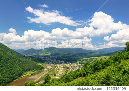 Mountain valley on a background of the river 133536409