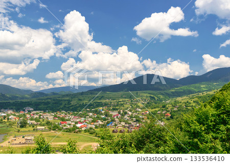 Mountain valley on a background of the rural landscape Mountain valley on a background of the rural landscape 133536410