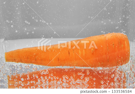 Juicy carrots in water 133536584