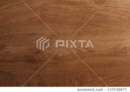 Natural wood texture background with horizontal grain and medium brown color 133536671