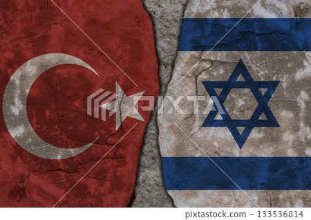 Symbolic split between Turkey and Israel flags on cracked stone wall texture Symbolic split between Turkey and Israel flags on cracked stone wall texture 133536814