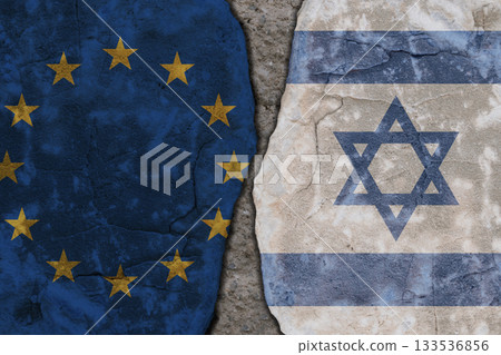 Symbolic split between European Union and Israel flags on cracked stone wall texture Symbolic split between European Union and Israel flags on cracked stone wall texture 133536856