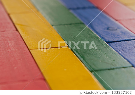 Bright multicolor wooden bricks, children's background in brick layout 133537102