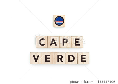Wooden blocks bearing the name and flag of Cape Verde. Cape Verdean and African Culture, national identity, travel, and geography in a copy space design. Wooden blocks bearing the name and flag of Cape Verde. Cape Verdean and African Culture, national identity, travel, and geography in a copy space design. 133537306