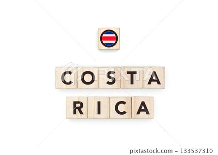 Wooden blocks bearing the name and flag of Costa Rica. Costa Rican and American Culture, national identity, travel, and geography in a copy space design. Wooden blocks bearing the name and flag of Costa Rica. Costa Rican and American Culture, national identity, travel, and geography in a copy space design. 133537310