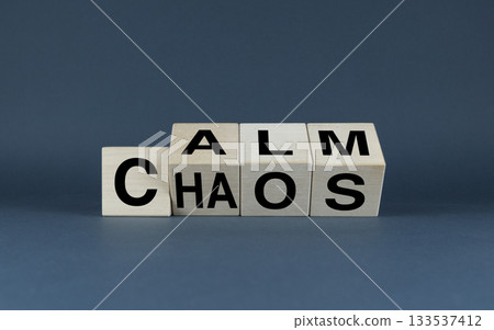 Calm or Chaos. Cubes form the words of choice Calm or Chaos. 133537412
