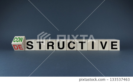 Cubes form words Constructive or destructive. Conflict and behavior concept 133537463