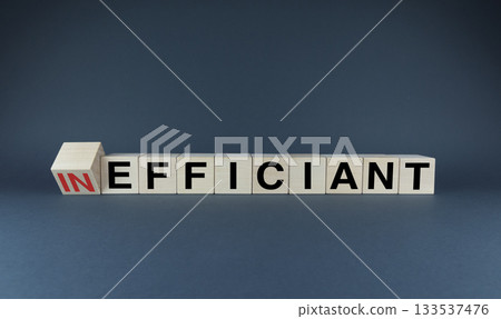 Cubes form words Inefficiant or efficiant. Concept of efficiency and productivity in both business and life Cubes form words Inefficiant or efficiant. Concept of efficiency and productivity in both business and life 133537476