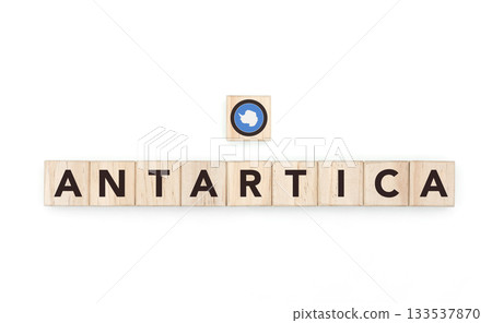 Wooden blocks bearing the name and flag of Antarctica. Multicultural and South Pole Culture, national identity, travel, and geography in a copy space design. Wooden blocks bearing the name and flag of Antarctica. Multicultural and South Pole Culture, national identity, travel, and geography in a copy space design. 133537870
