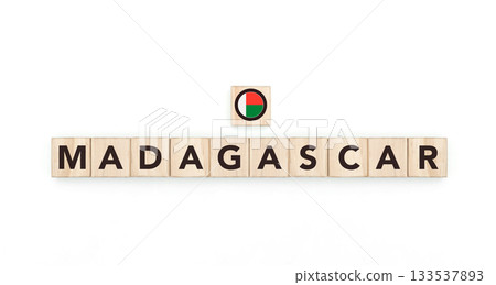 Wooden blocks bearing the name and flag of Madagascar. Malagasy and African Culture, national identity, travel, and geography in a copy space design. 133537893