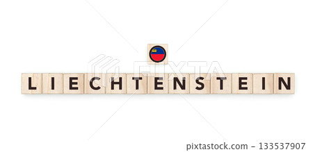 Wooden blocks bearing the name and flag of Liechtenstein. Liechtensteiner and European Culture, national identity, travel, and geography in a copy space design. 133537907