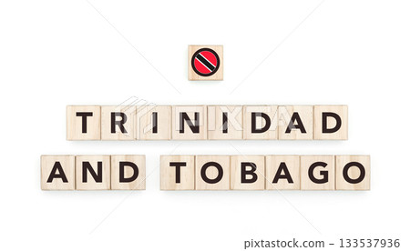 Wooden blocks bearing the name and flag of Trinidad And Tobago. Trinibagonian and Caribbean Culture, national identity, travel, and geography in a copy space design. 133537936