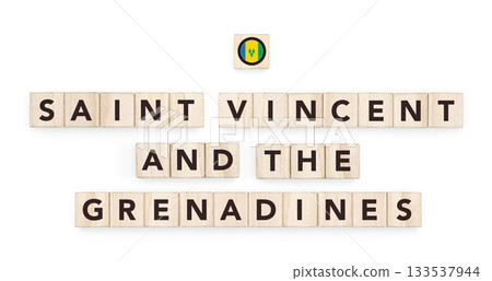 Wooden blocks bearing the name and flag of Saint Vincent and the Grenadines. Grenadinian and Caribbean Culture, national identity, travel, and geography in a copy space design. 133537944