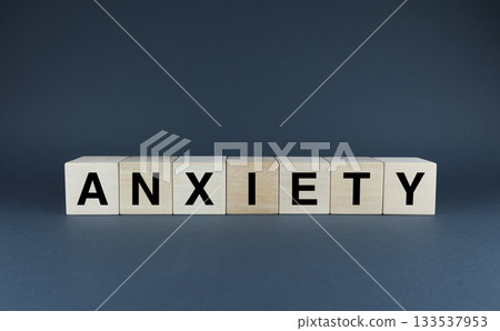 Anxiety. Cubes form the word Anxiety. Concept of Anxiety, emotional state 133537953