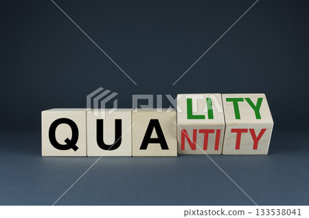 Quality or Quantity. The cubes form the choice words Quality or Quantity. Quality or Quantity. The cubes form the choice words Quality or Quantity. 133538041