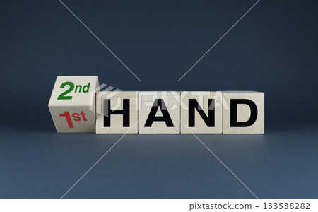 Cubes form the words 1st hand - 2nd hand. 133538282