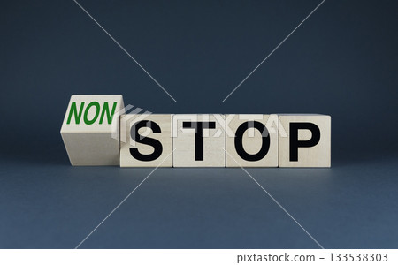 Stop or non-stop. Cubes form the words Stop to non-stop 133538303