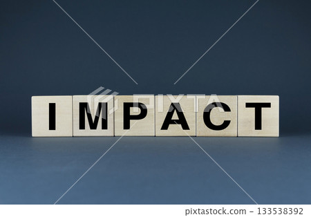 Impact. Cubes form the word Impact. Concept of Impact in business and other fields 133538392