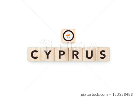 Wooden blocks bearing the name and flag of Cyprus. Cypriot and Mediterranean Culture, national identity, travel, and geography in a copy space design. Wooden blocks bearing the name and flag of Cyprus. Cypriot and Mediterranean Culture, national identity, travel, and geography in a copy space design. 133538498