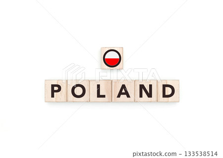 Wooden blocks bearing the name and flag of Poland. Polish and North European Culture, national identity, travel, and geography in a copy space design. Wooden blocks bearing the name and flag of Poland. Polish and North European Culture, national identity, travel, and geography in a copy space design. 133538514