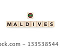 Wooden blocks bearing the name and flag of Maldivas. Maldivian and North Indian Culture, national identity, travel, and geography in a copy space design. 133538544