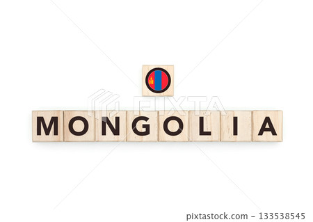 Wooden blocks bearing the name and flag of Mongolia. Mongolian and Asian Culture, national identity, travel, and geography in a copy space design. 133538545