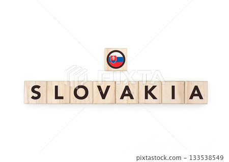 Wooden blocks bearing the name and flag of Slovakia. Slovak and East European Culture, national identity, travel, and geography in a copy space design. 133538549