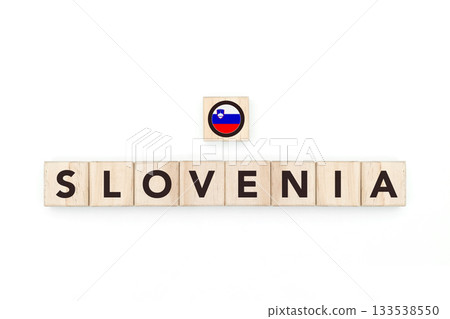 Wooden blocks bearing the name and flag of Slovenia. Sloven and East European Culture, national identity, travel, and geography in a copy space design. 133538550