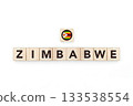 Wooden blocks bearing the name and flag of Zimbabwe. Zimbabwean and South African Culture, national identity, travel, and geography in a copy space design. 133538554
