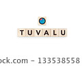 Wooden blocks bearing the name and flag of Tuvalu. Tuvaluan and Micronesia Culture, national identity, travel, and geography in a copy space design. 133538558