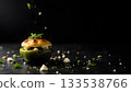 Savory Stuffed Green Pepper with Crispy Topping on Dark Background 133538766