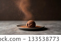 Silky Chocolate Ice Cream with Cocoa Dust on a Minimalist Plate Against Dark Background 133538773