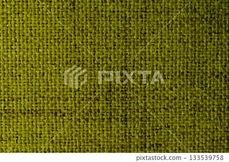 Yellow green fabric background, bookbinding cloth, overlapping threads 133539758