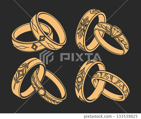 Elegant golden wedding rings collection. Set of wedding rings with floral ornament on black background. Elegant golden wedding rings collection. Set of wedding rings with floral ornament on black background. 133539825