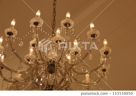 Close-up of a gorgeous sparkling crystal chandelier Close-up of a gorgeous sparkling crystal chandelier 133539850