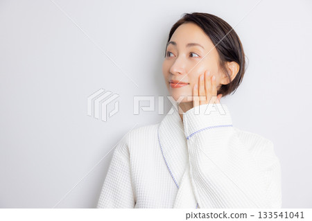 Woman in bathrobe 133541041