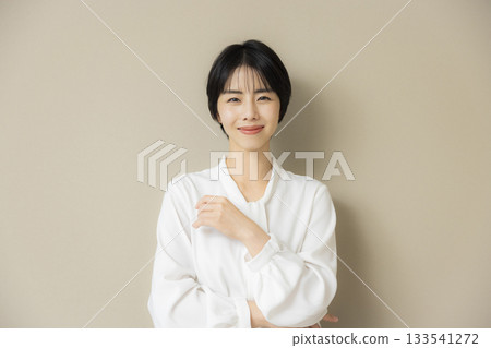 Business woman in a white blouse Business woman in a white blouse 133541272