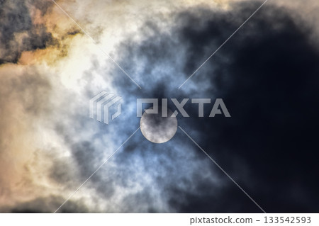 Full moon with dramatic cloudscape. Cloudy overcast sky with moon. Nature scene. Full moon with dramatic cloudscape. Cloudy overcast sky with moon. Nature scene. 133542593