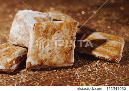 Sardinian mostaccioli on a wooden board Sardinian mostaccioli on a wooden board 133543060