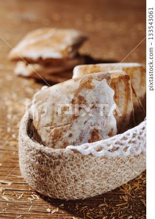 basket filled with traditional italian mostaccioli 133543061