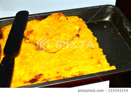 Casserole made from cottage cheese and pumpkin. 133543154