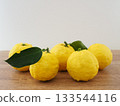 Yuzu fruit on the table 133544116