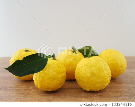 Yuzu fruit on the table Yuzu fruit on the table 133544116