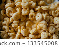 Crunchy Corn Snacks Piled in a Heap 133545008