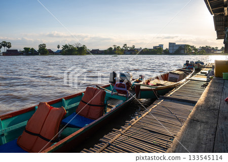 Bujis fishing boat near floating house, Lake Tempe, Indonesia Bujis fishing boat near floating house, Lake Tempe, Indonesia 133545114