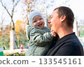 Joyful Father and Baby Moment 133545161