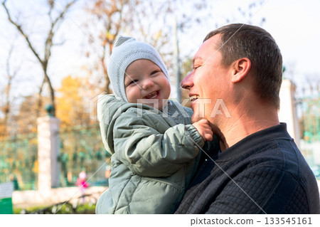 Joyful Father and Baby Moment 133545161